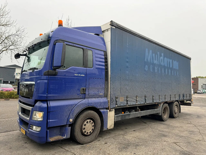 MAN TGX 26.400 6X2 - EURO 4 + LIFT + STEERING AXLE - Φορτηγό μουσαμάς: φωτογραφία 1 MAN TGX 26.400 6X2 - EURO 4 + LIFT + STEERING AXLE - Φορτηγό μουσαμάς: φωτογραφία 1