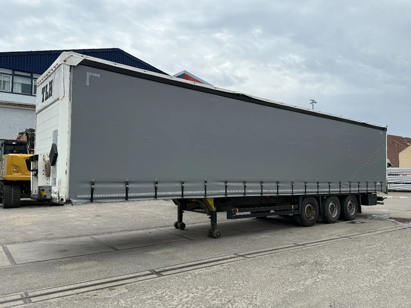 Schmitz Cargobull 3 AXLE + COIL - DISC BRAKES + SLIDING ROOF - Επικαθήμενο κουρτίνα: φωτογραφία 1 Schmitz Cargobull 3 AXLE + COIL - DISC BRAKES + SLIDING ROOF - Επικαθήμενο κουρτίνα: φωτογραφία 1