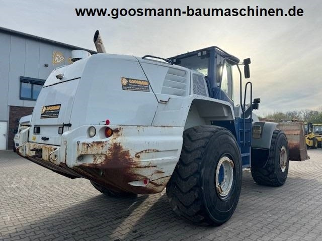 Liebherr L 586 - Ελαστιχοφόρος φορτωτής: φωτογραφία 5 Liebherr L 586 - Ελαστιχοφόρος φορτωτής: φωτογραφία 5