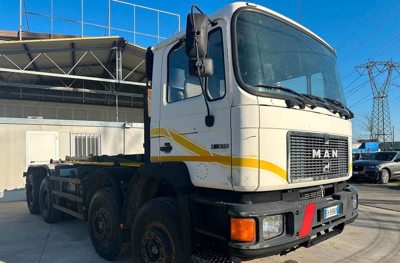 Man 4 assi scarrabile - Φορτηγό φόρτωσης γάντζου: φωτογραφία 1 Man 4 assi scarrabile - Φορτηγό φόρτωσης γάντζου: φωτογραφία 1