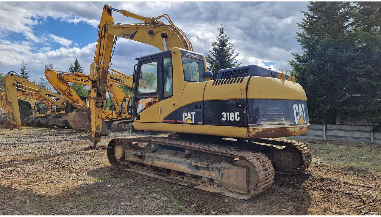 Caterpillar 318C - Ερπυστριοφόρος εκσκαφέας: φωτογραφία 1 Caterpillar 318C - Ερπυστριοφόρος εκσκαφέας: φωτογραφία 1