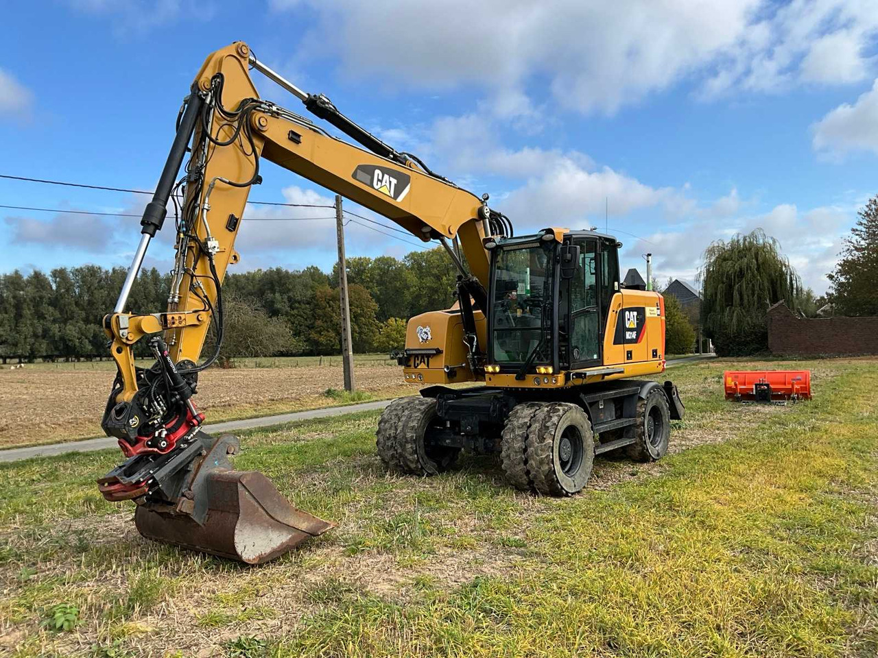 Caterpillar M314F - Τροχοφόρος εκσκαφέας: φωτογραφία 1 Caterpillar M314F - Τροχοφόρος εκσκαφέας: φωτογραφία 1