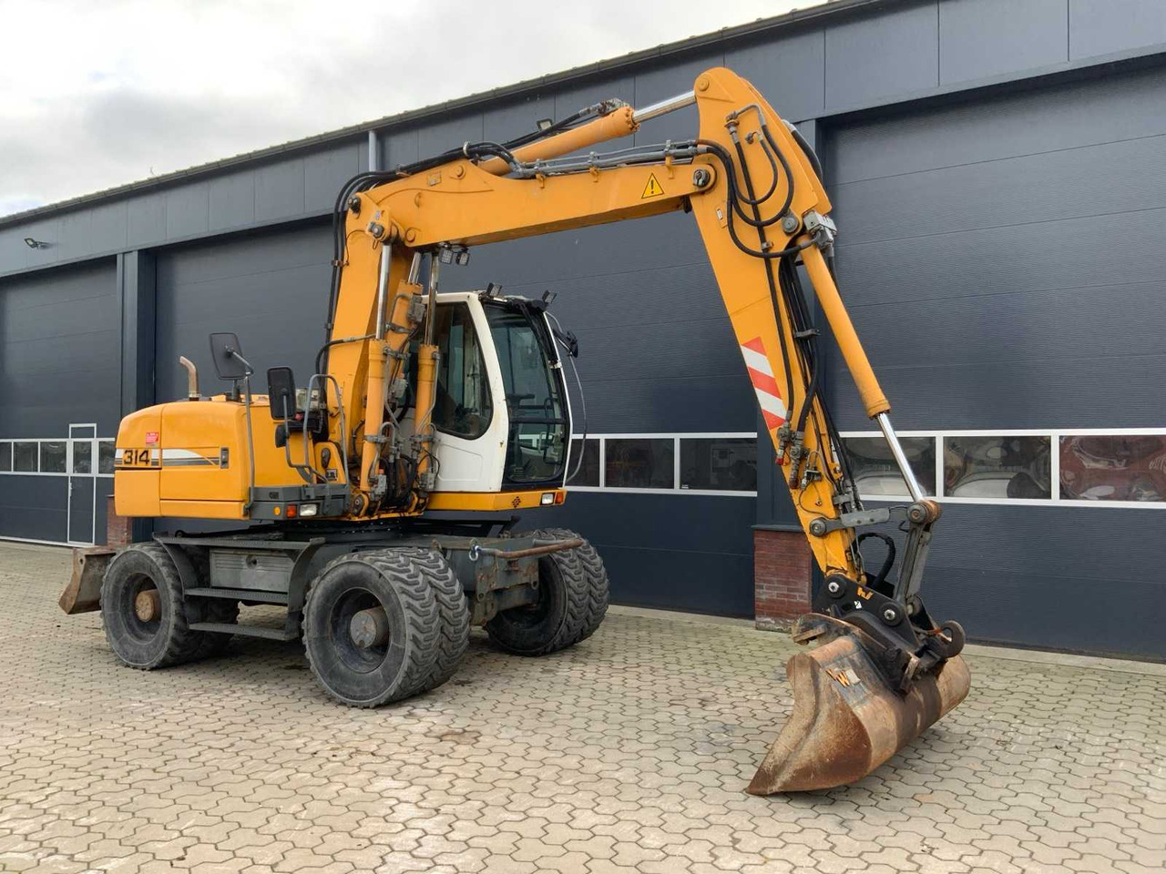 Liebherr A314 Litronic - Τροχοφόρος εκσκαφέας: φωτογραφία 2 Liebherr A314 Litronic - Τροχοφόρος εκσκαφέας: φωτογραφία 2