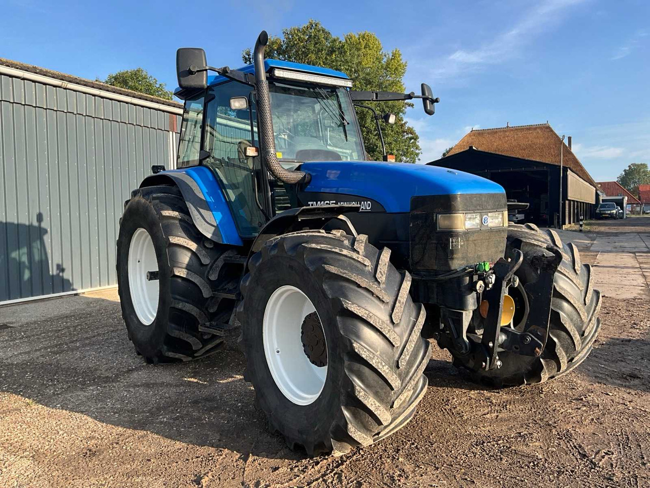 New Holland TM165 - Τρακτέρ: φωτογραφία 4 New Holland TM165 - Τρακτέρ: φωτογραφία 4