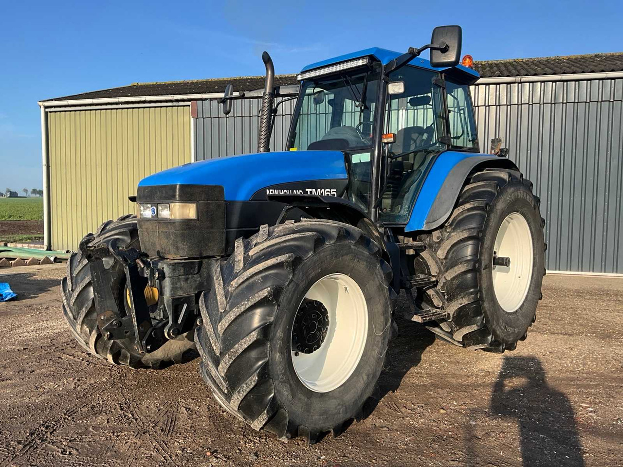 New Holland TM165 - Τρακτέρ: φωτογραφία 2 New Holland TM165 - Τρακτέρ: φωτογραφία 2