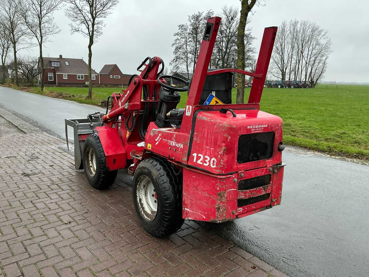 Ελαστιχοφόρος φορτωτής WEIDEMANN SHOVEL 1230: φωτογραφία 11