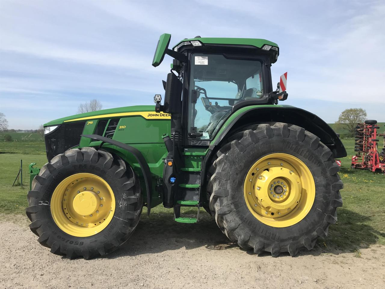 John Deere 7R 310 - Τρακτέρ: φωτογραφία 1 John Deere 7R 310 - Τρακτέρ: φωτογραφία 1