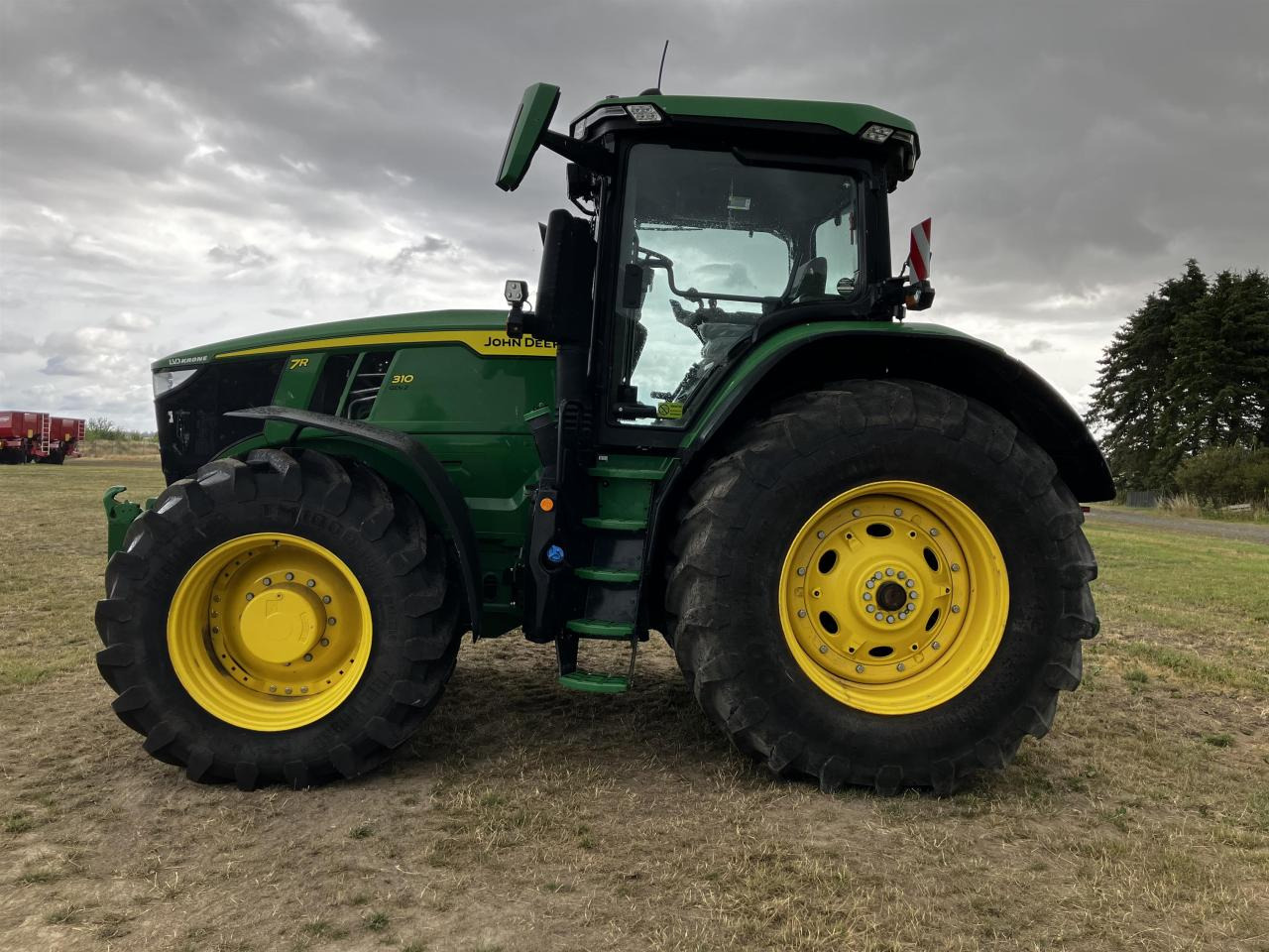 John Deere 7R 310 - Τρακτέρ: φωτογραφία 1 John Deere 7R 310 - Τρακτέρ: φωτογραφία 1