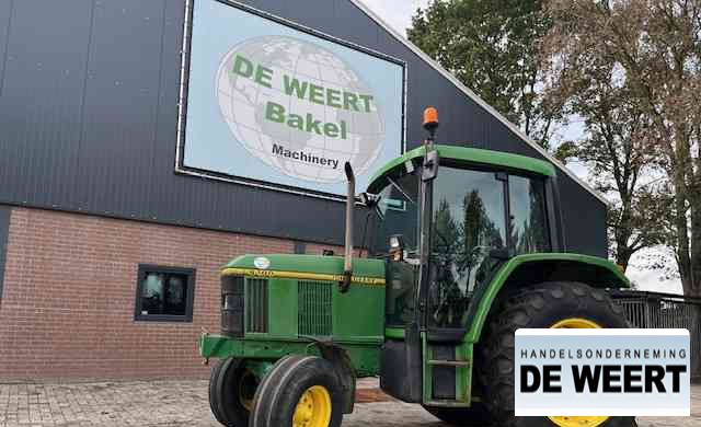 John Deere 6100 - Τρακτέρ: φωτογραφία 1 John Deere 6100 - Τρακτέρ: φωτογραφία 1