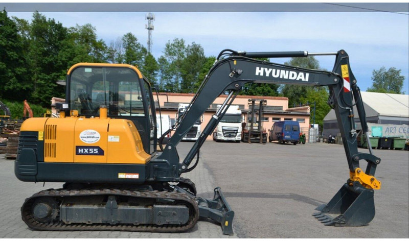 Hyundai HX55 Mini lánctalpas forgókotró - Μίνι εκσκαφέας: φωτογραφία 4 Hyundai HX55 Mini lánctalpas forgókotró - Μίνι εκσκαφέας: φωτογραφία 4