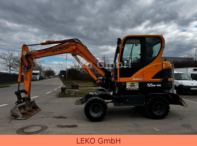 Hyundai Robex 55W-9A Mit Drei Löffeln - Τροχοφόρος εκσκαφέας: φωτογραφία 4 Hyundai Robex 55W-9A Mit Drei Löffeln - Τροχοφόρος εκσκαφέας: φωτογραφία 4