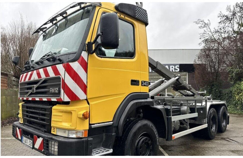 Volvo FM12 6x6 Hook lift - Φορτηγό φόρτωσης γάντζου: φωτογραφία 1 Volvo FM12 6x6 Hook lift - Φορτηγό φόρτωσης γάντζου: φωτογραφία 1