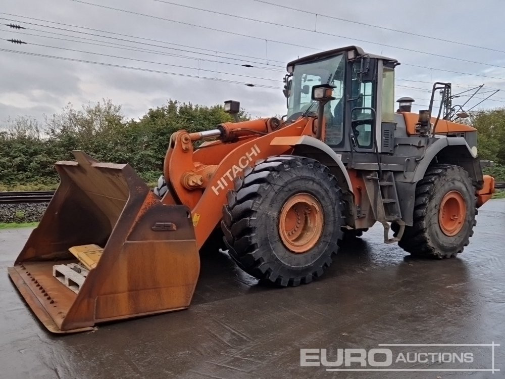 2010 Hitachi ZW310 - Ελαστιχοφόρος φορτωτής: φωτογραφία 1 2010 Hitachi ZW310 - Ελαστιχοφόρος φορτωτής: φωτογραφία 1