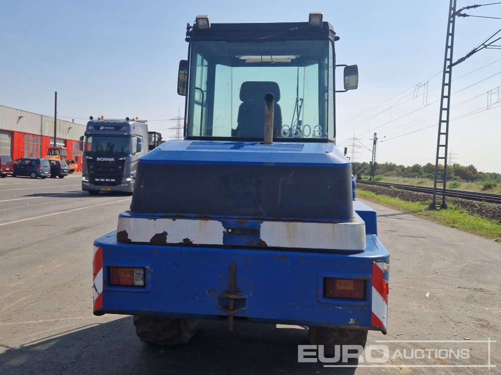 Schaeff ZL100 - Ελαστιχοφόρος φορτωτής: φωτογραφία 4 Schaeff ZL100 - Ελαστιχοφόρος φορτωτής: φωτογραφία 4
