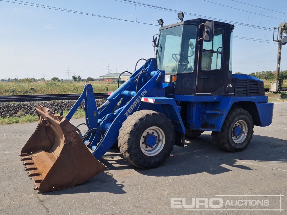 Schaeff ZL100 - Ελαστιχοφόρος φορτωτής: φωτογραφία 1 Schaeff ZL100 - Ελαστιχοφόρος φορτωτής: φωτογραφία 1