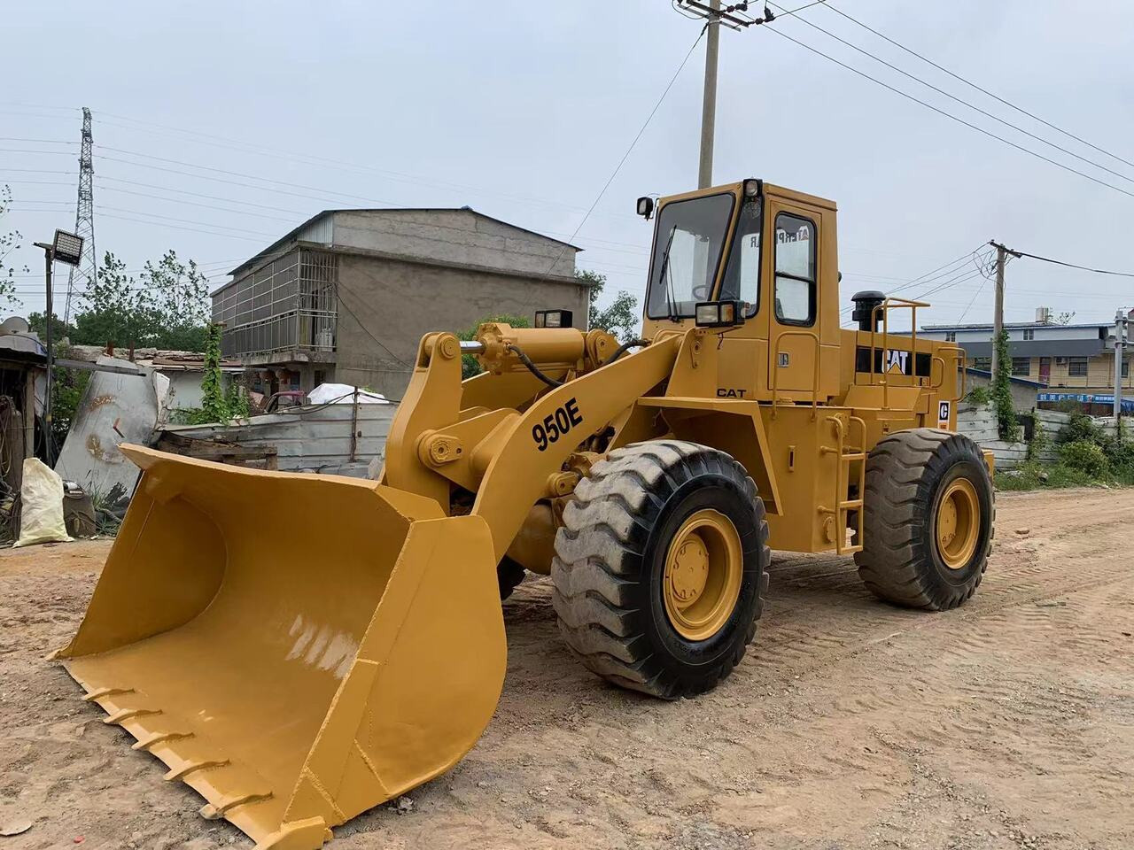 CATERPILLAR 950E - Ελαστιχοφόρος φορτωτής: φωτογραφία 1 CATERPILLAR 950E - Ελαστιχοφόρος φορτωτής: φωτογραφία 1
