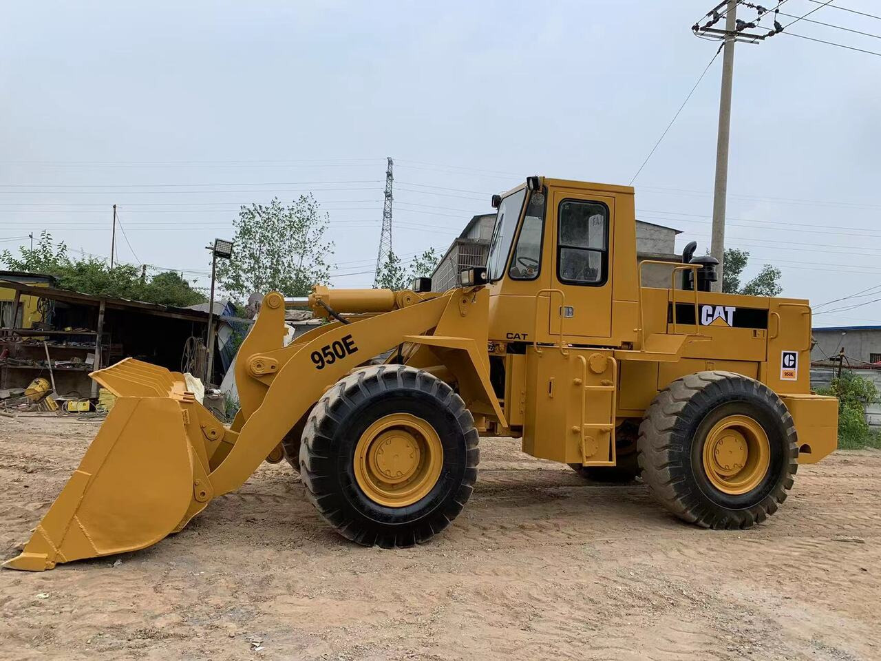 CATERPILLAR 950E - Ελαστιχοφόρος φορτωτής: φωτογραφία 4 CATERPILLAR 950E - Ελαστιχοφόρος φορτωτής: φωτογραφία 4