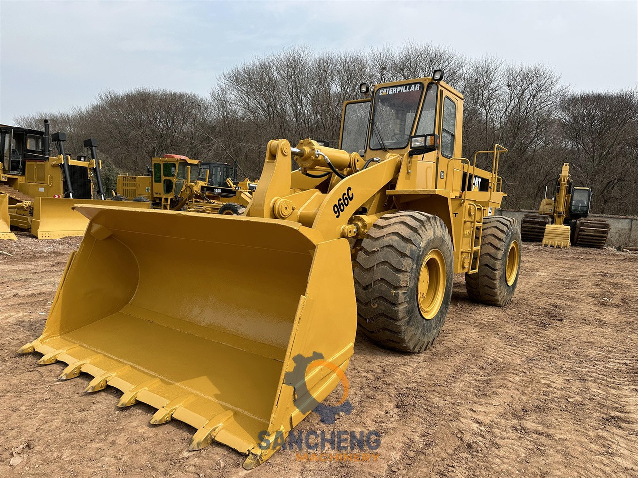 Ελαστιχοφόρος φορτωτής CATERPILLAR 966C: φωτογραφία 11