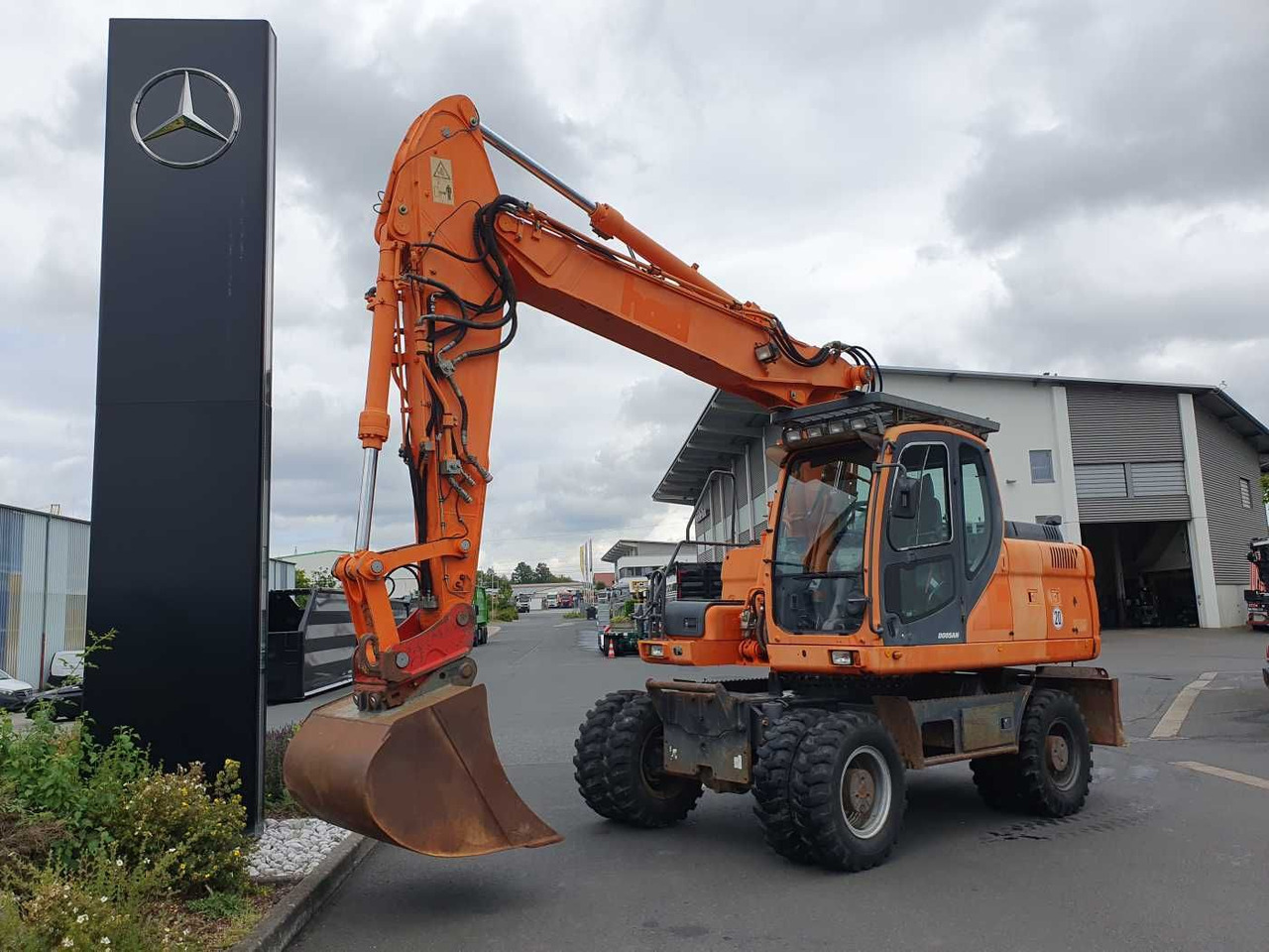 Doosan DX190W / 2008 / 12.349h / 1x Tieflöffel - Τροχοφόρος εκσκαφέας: φωτογραφία 1 Doosan DX190W / 2008 / 12.349h / 1x Tieflöffel - Τροχοφόρος εκσκαφέας: φωτογραφία 1