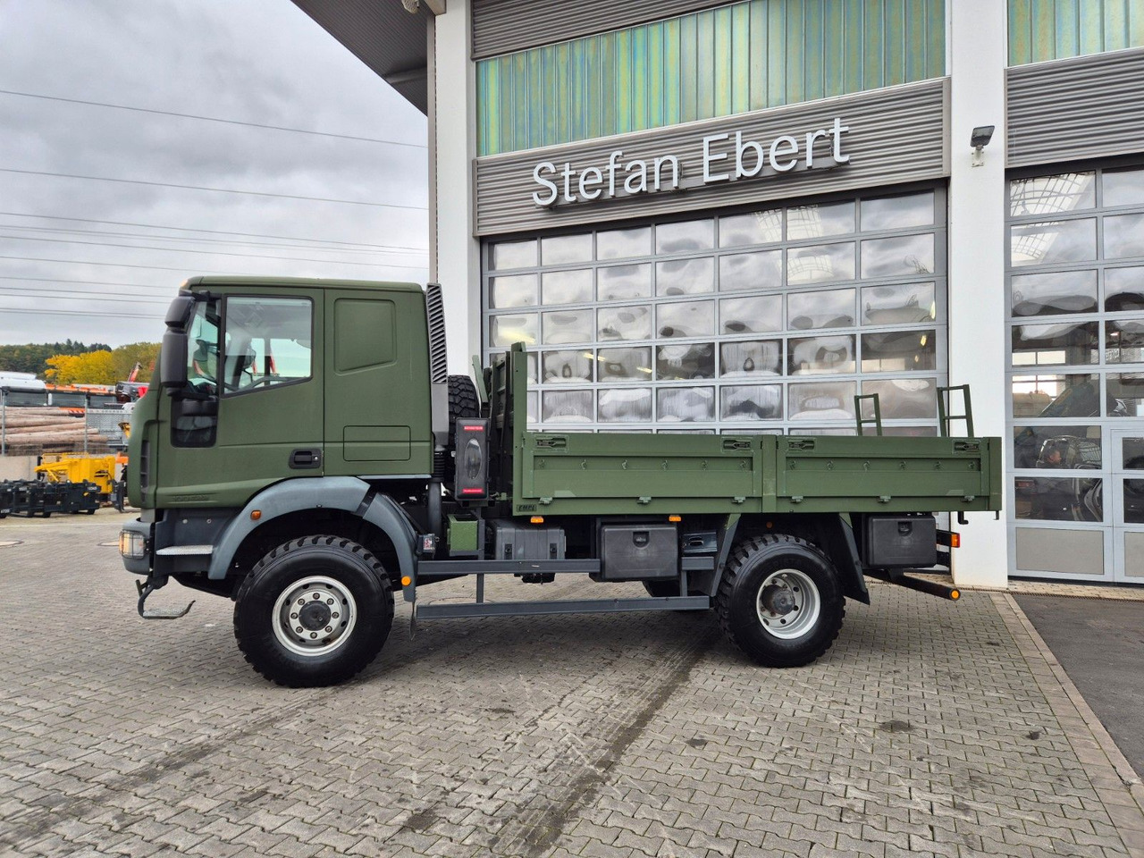 Iveco Eurocargo ML100E22WM-BW 4x4 Pritsche L-Haus Bett - Φορτηγό με ανοιχτή καρότσα: φωτογραφία 5 Iveco Eurocargo ML100E22WM-BW 4x4 Pritsche L-Haus Bett - Φορτηγό με ανοιχτή καρότσα: φωτογραφία 5