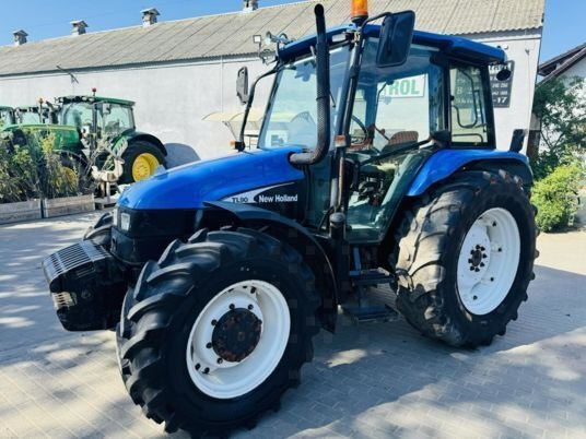 New Holland TL90 - Τρακτέρ: φωτογραφία 1 New Holland TL90 - Τρακτέρ: φωτογραφία 1