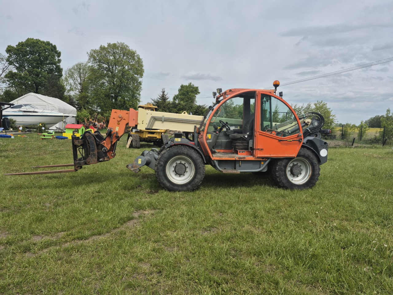 JLG 4013 - Τηλεσκοπικός μπροστινός φορτωτής: φωτογραφία 1 JLG 4013 - Τηλεσκοπικός μπροστινός φορτωτής: φωτογραφία 1