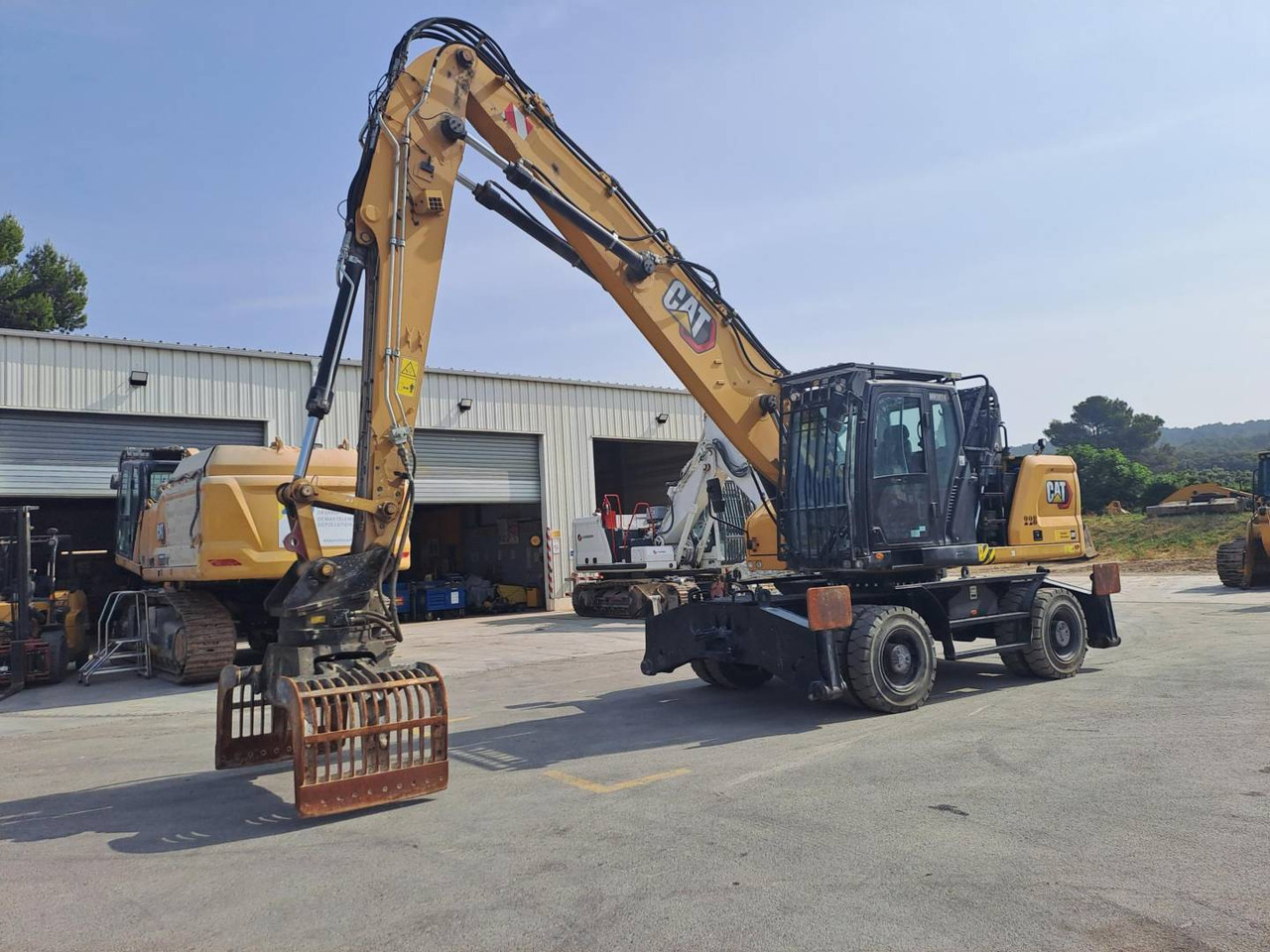 CAT MH3024 - Τροχοφόρος εκσκαφέας: φωτογραφία 1 CAT MH3024 - Τροχοφόρος εκσκαφέας: φωτογραφία 1