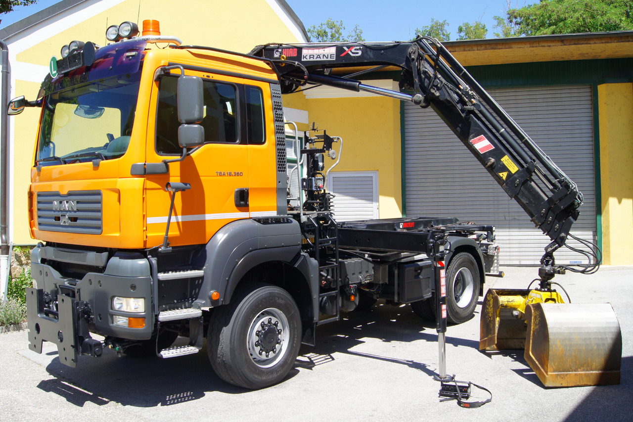 MAN TGA 18.360 BL 4x4/Euro 4/TÜV/HIAB 111 korbfähig/MULTILIFT/Winterdienst - Φορτηγό φόρτωσης γάντζου, Φορτηγό με γερανό: φωτογραφία 2 MAN TGA 18.360 BL 4x4/Euro 4/TÜV/HIAB 111 korbfähig/MULTILIFT/Winterdienst - Φορτηγό φόρτωσης γάντζου, Φορτηγό με γερανό: φωτογραφία 2