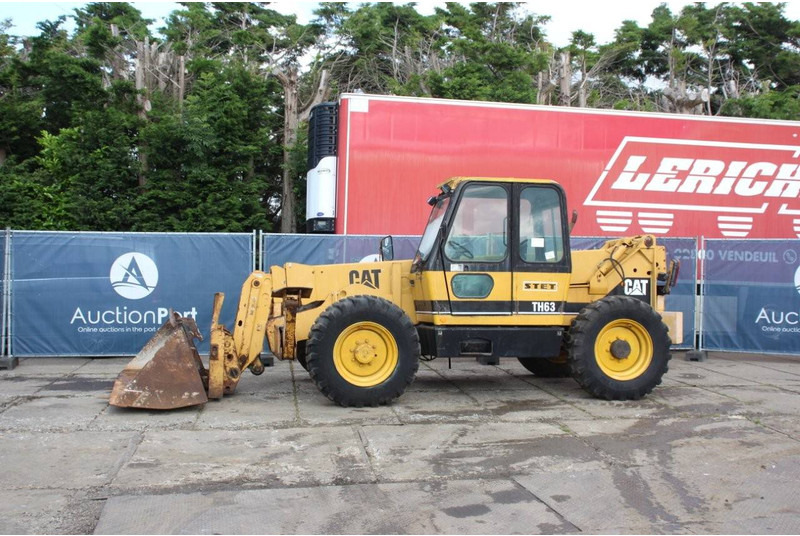 Caterpillar TH63 - Τηλεσκοπικός φορτωτής: φωτογραφία 1 Caterpillar TH63 - Τηλεσκοπικός φορτωτής: φωτογραφία 1