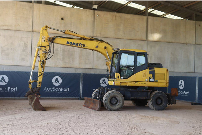 Komatsu PW140-7 - Τροχοφόρος εκσκαφέας: φωτογραφία 1 Komatsu PW140-7 - Τροχοφόρος εκσκαφέας: φωτογραφία 1