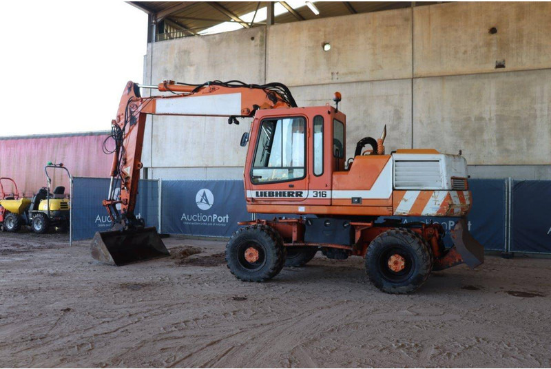 Liebherr A316 - Τροχοφόρος εκσκαφέας: φωτογραφία 3 Liebherr A316 - Τροχοφόρος εκσκαφέας: φωτογραφία 3