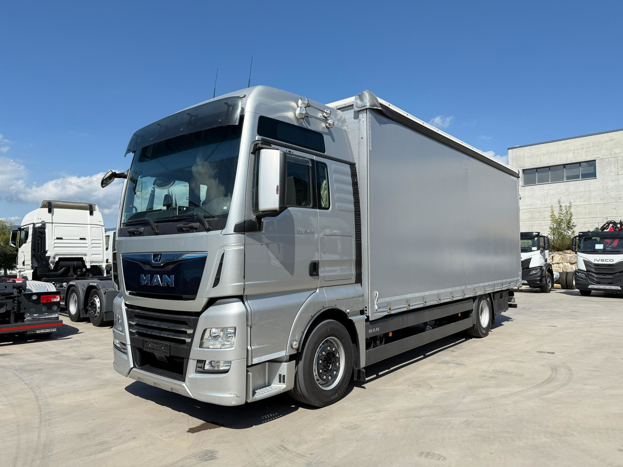 MAN 18.430 LL TGX E6 (Tauliner) - Φορτηγό μουσαμάς: φωτογραφία 1 MAN 18.430 LL TGX E6 (Tauliner) - Φορτηγό μουσαμάς: φωτογραφία 1