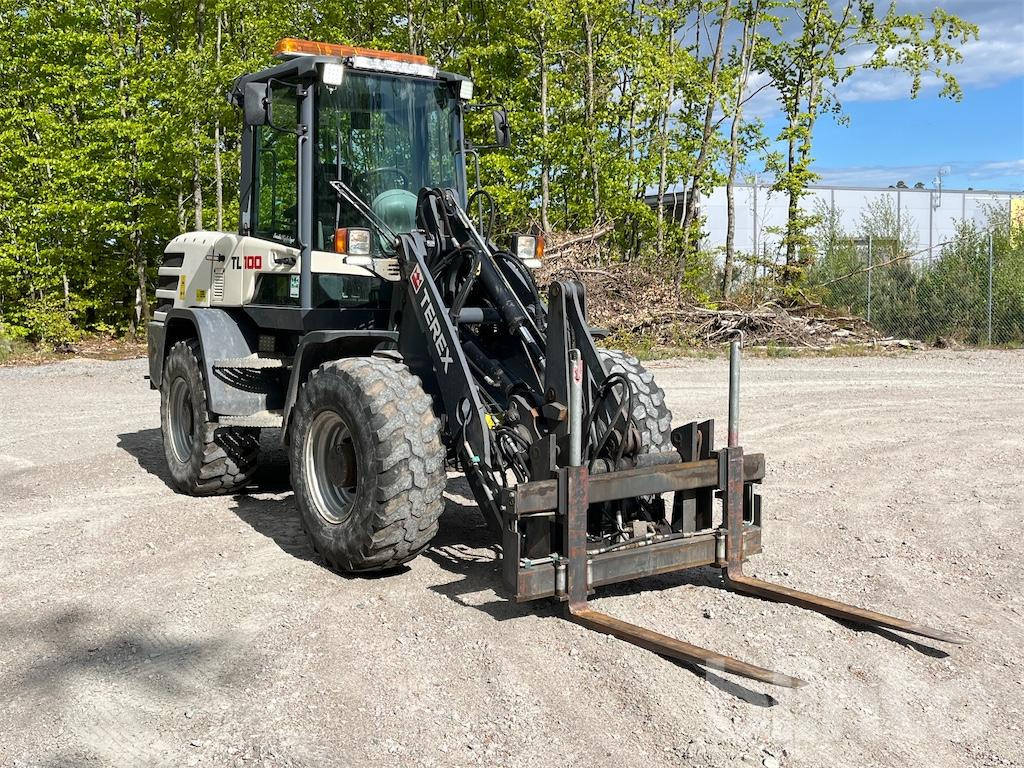 Terex TL100 - Ελαστιχοφόρος φορτωτής: φωτογραφία 3 Terex TL100 - Ελαστιχοφόρος φορτωτής: φωτογραφία 3
