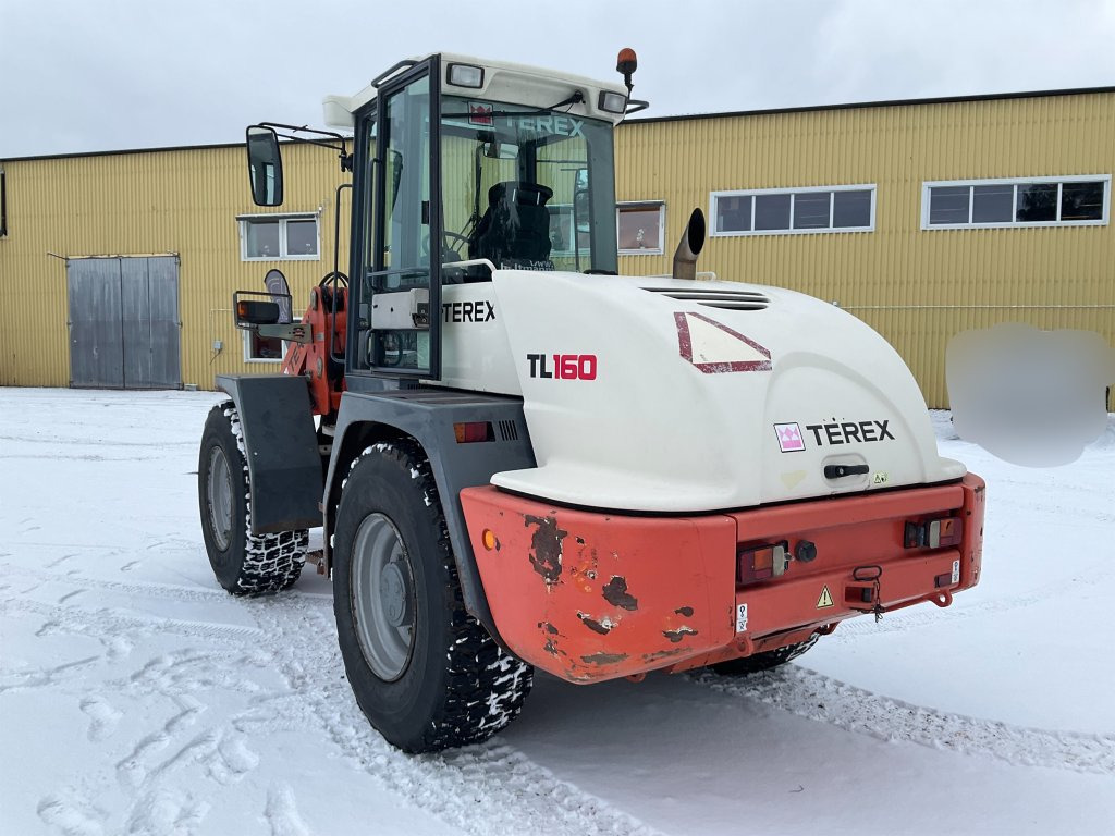Terex TL160 - Ελαστιχοφόρος φορτωτής: φωτογραφία 3 Terex TL160 - Ελαστιχοφόρος φορτωτής: φωτογραφία 3