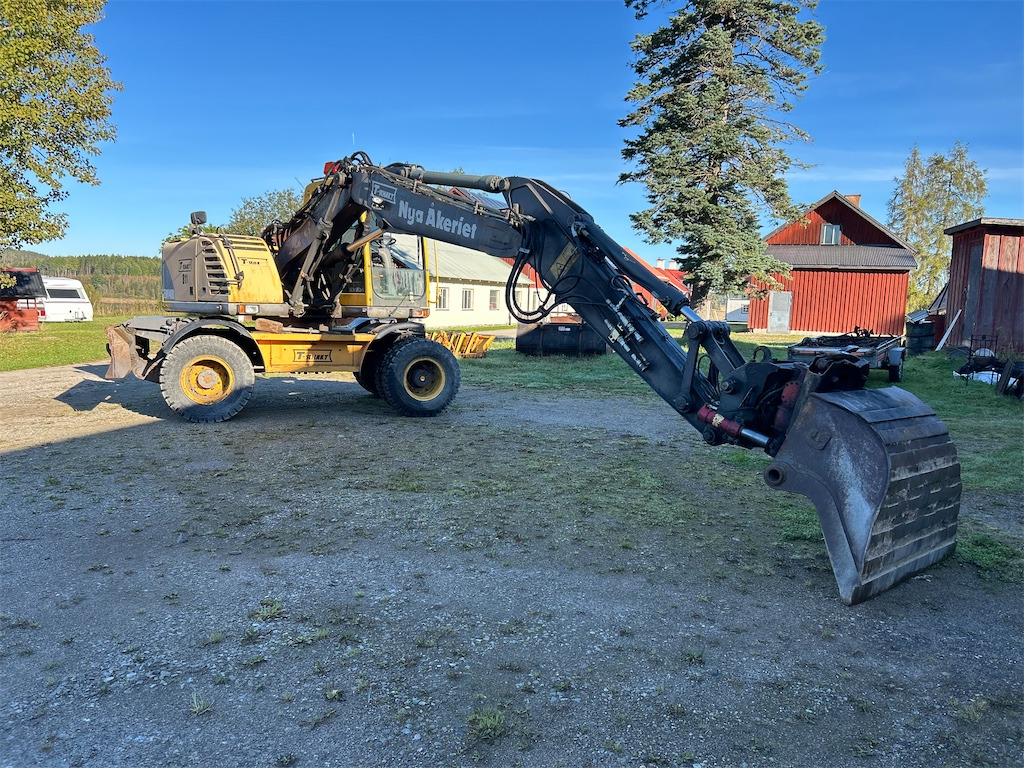 Volvo EW140B - Τροχοφόρος εκσκαφέας: φωτογραφία 2 Volvo EW140B - Τροχοφόρος εκσκαφέας: φωτογραφία 2