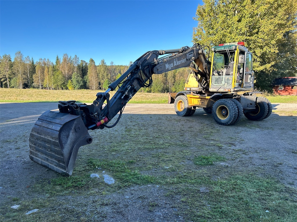 Volvo EW140B - Τροχοφόρος εκσκαφέας: φωτογραφία 1 Volvo EW140B - Τροχοφόρος εκσκαφέας: φωτογραφία 1