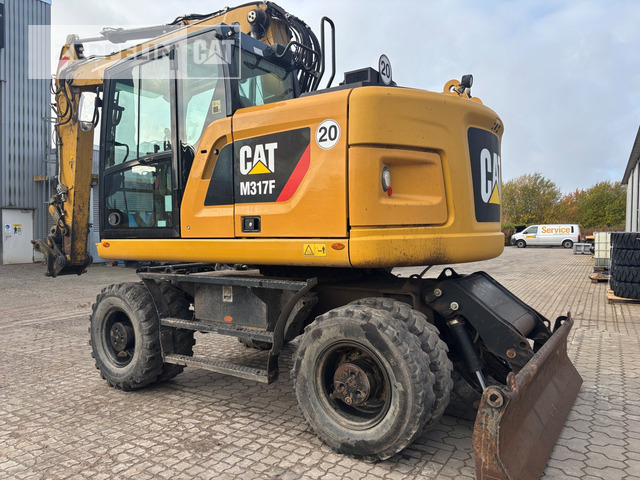 Cat M317F - Τροχοφόρος εκσκαφέας: φωτογραφία 1 Cat M317F - Τροχοφόρος εκσκαφέας: φωτογραφία 1