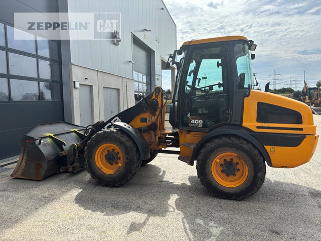 Jcb 409 - Ελαστιχοφόρος φορτωτής: φωτογραφία 1 Jcb 409 - Ελαστιχοφόρος φορτωτής: φωτογραφία 1